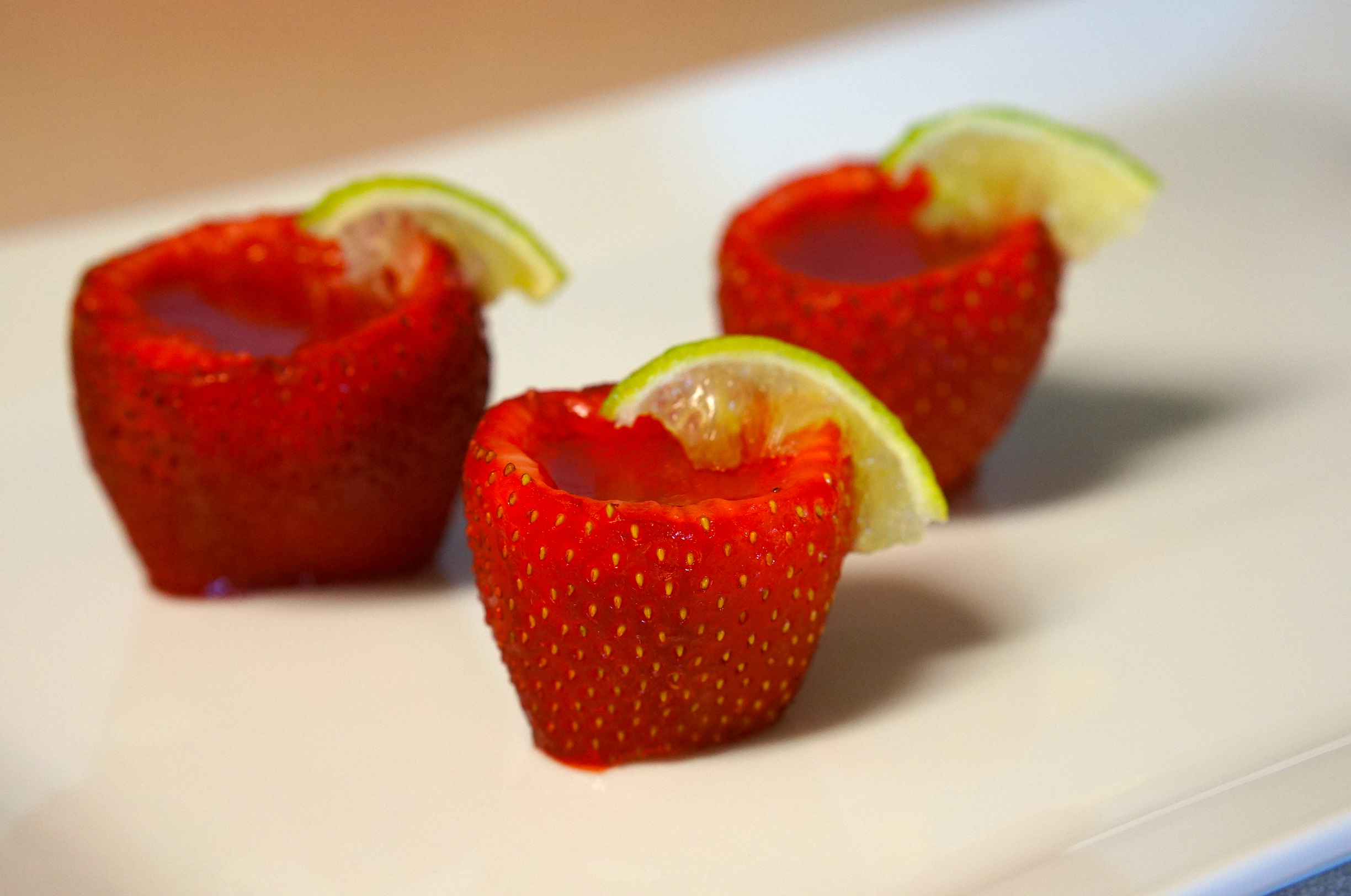 margarita tequila jello shots in a strawberry